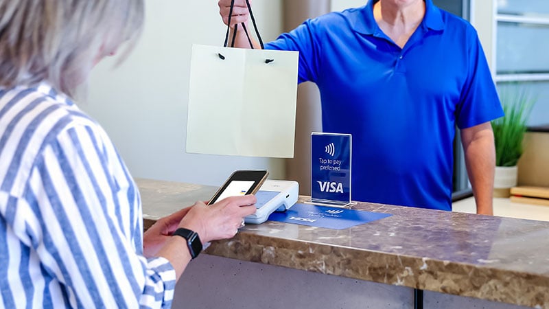 woman making mobile payment