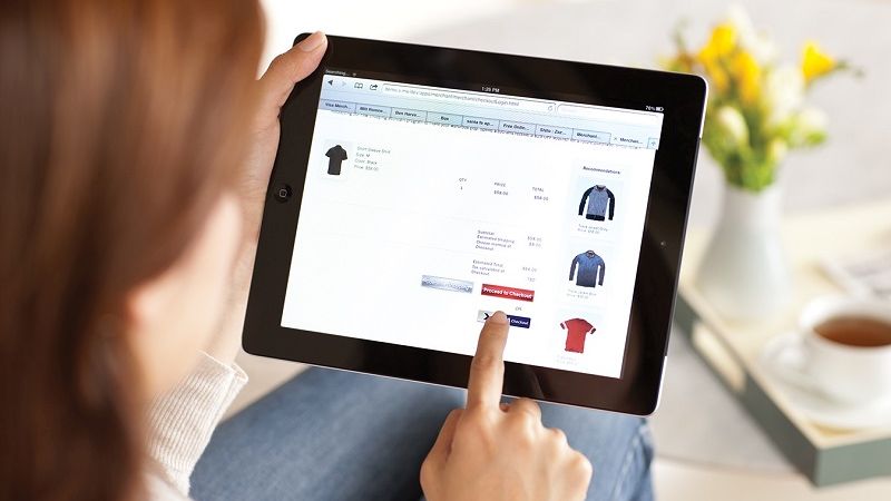 Woman shopping online on a tablet