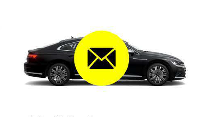 Envelope icon over Black car 