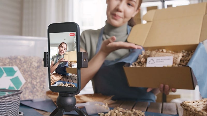 woman recording herself on mobile