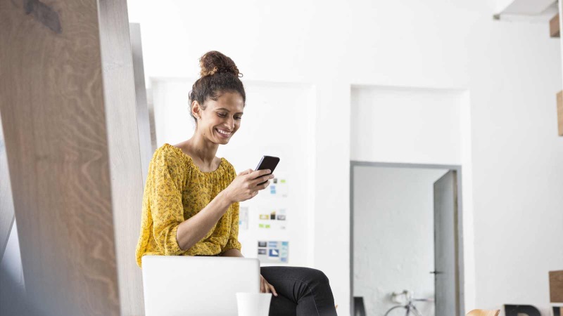 market-my-business-v2-800x450 Person smiling looking at phone