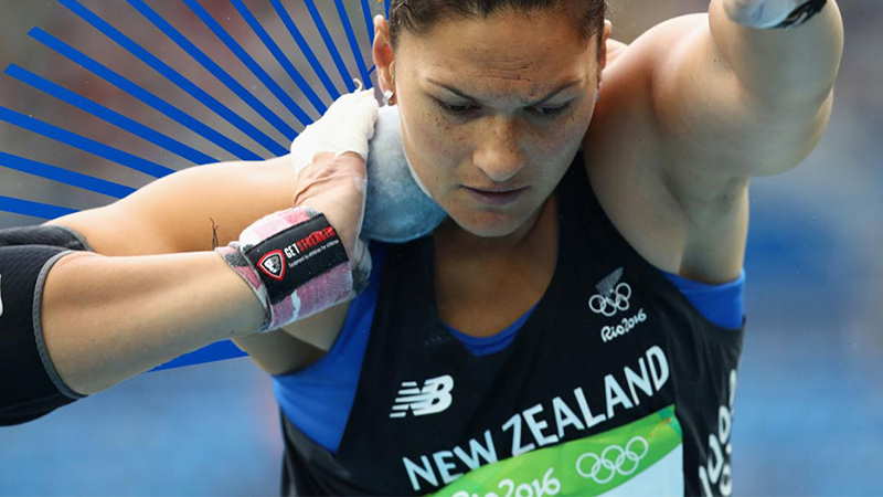 Female Olympic athlete about to throw shotput